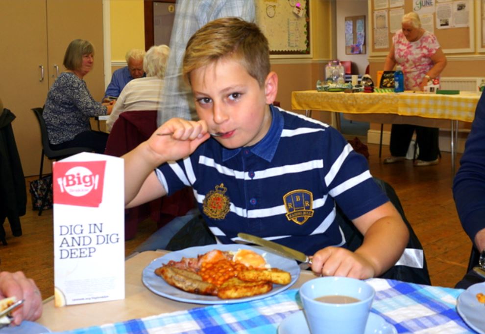 charlie sutton stuck into breakfast