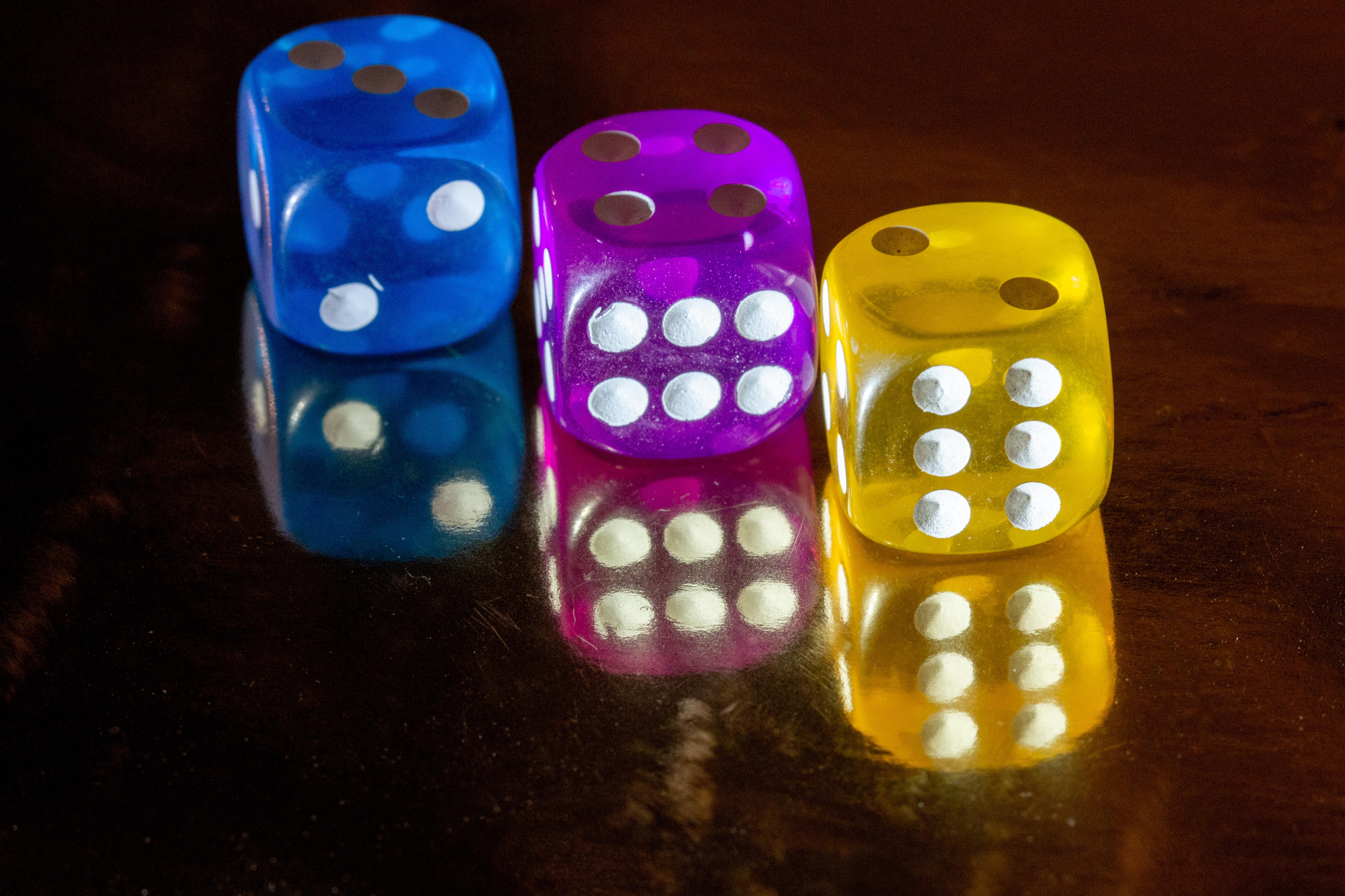 Three dice reflected