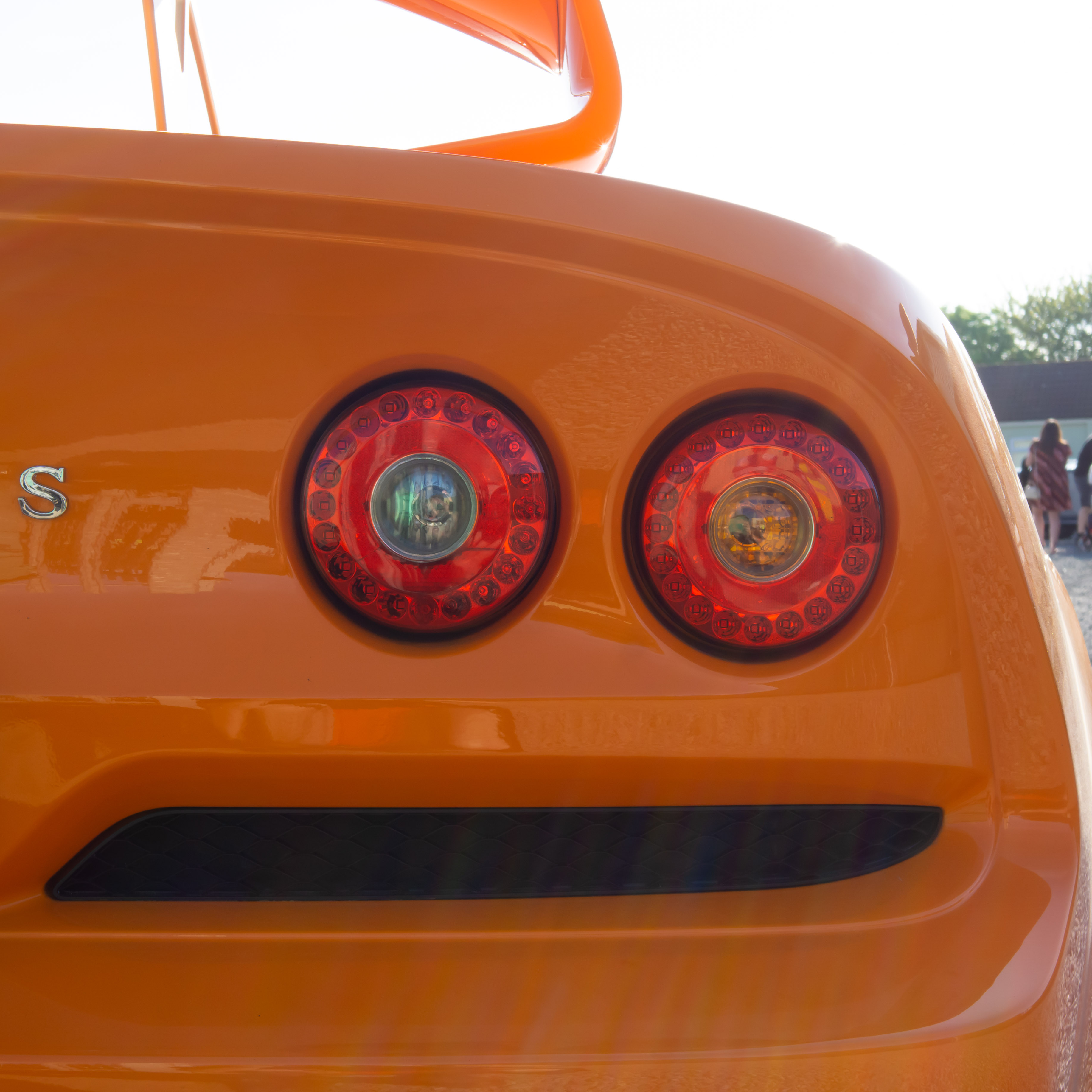 Red eyes Black smile orange car